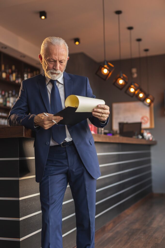 Senior businessman analyzing documenatation